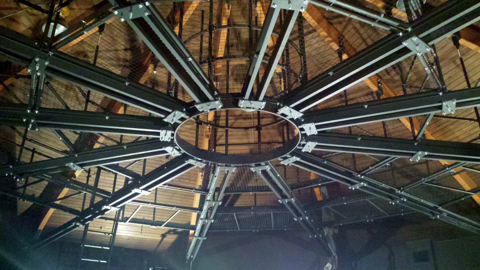 Looking up at the decagonal (ten-sided) SkyDeck tension grid at St. Edwards University.