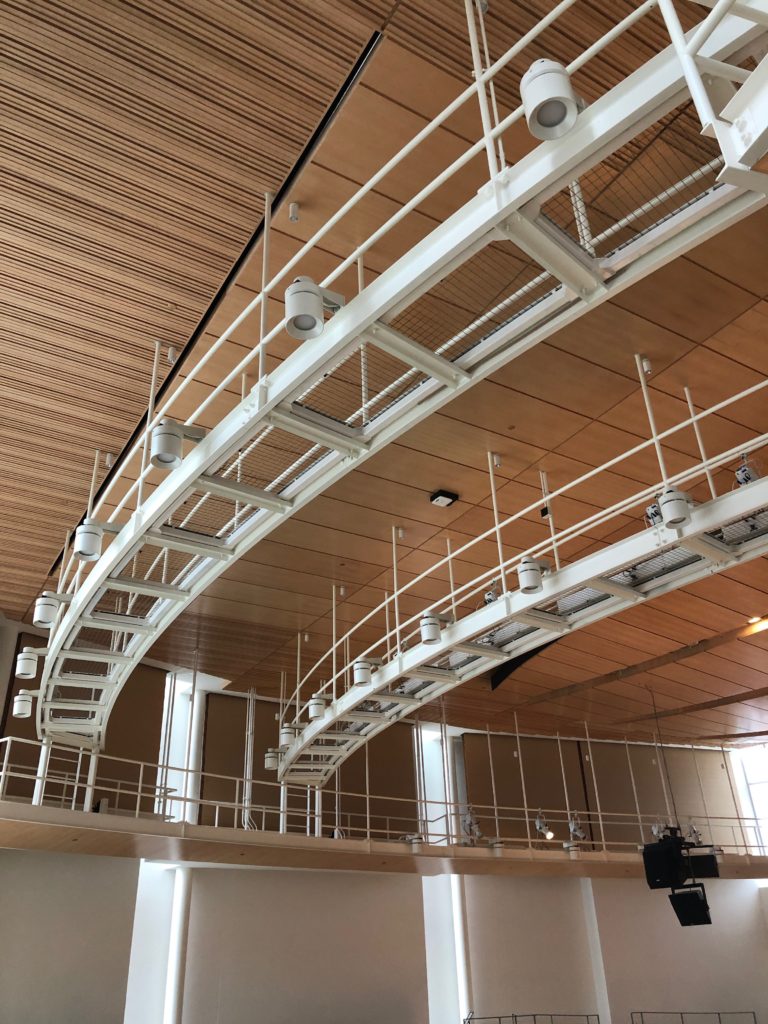 Curved SkyDeck tension wire grid in Penn State's Esber Recital Hall. Photo courtesy of Russell Bloom.